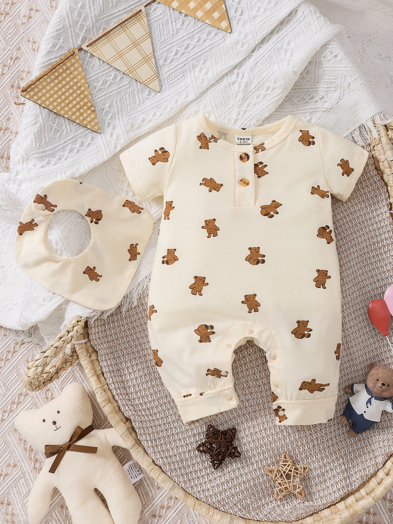 167307358308371bb864a0f83f4ee3008d40de9cc7 Newborn Baby Boy Bear Print Jumpsuit & Bib - Image 1